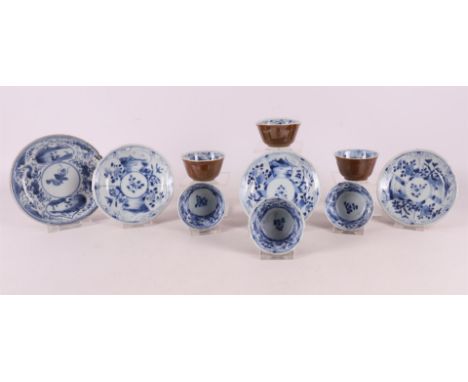 A series of six blue/white Batavia porcelain cups and four saucers, China, 18th century. Blue underglaze decoration of flora 