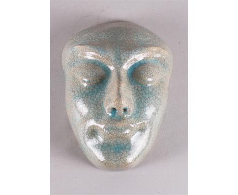 An earthenware mask with crackled light blue glaze, design &amp; execution: Pieter Groeneveldt, in his own studio / Voorschot