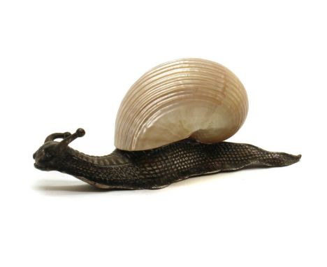 A German Art Nouveau silvered paperweight,circa 1900, by WMF, modeled as a snail, with a mother-of-pearl shell, 11cm wideLite