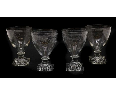 A group of four glass rummers,c.1800, comprising a pair each engraved with a cipher and ribbon-tied swags, raised on a lemon 