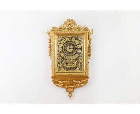 A gilt and gesso wall clock, probably 19th century, Maltese, the moulded rectangular case with shaped pediment and apron, a d