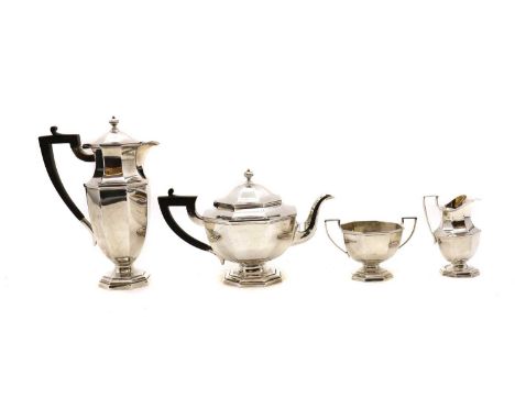 A four piece silver tea service,by Mappin &amp; Webb, Sheffield 1971, of octagonal form, comprising a hot water jug, 26cm hig