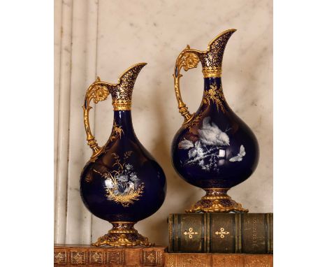 A pair of Royal Crown Derby Limoges enamel ewers,  late 19th century, Limoges enamel, with a small bird seated on a branch wa