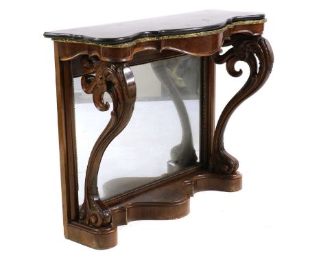 A walnut serpentine console table,19th century, with a polished slate top, over a mirror back and cabriole supports,94cm wide