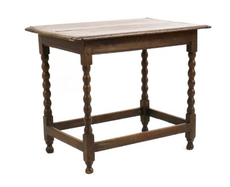 An oak side table,17th century, with cleated ends on bobbin turned and joint legs87cm wide58cm deep74cm highCondition ReportL