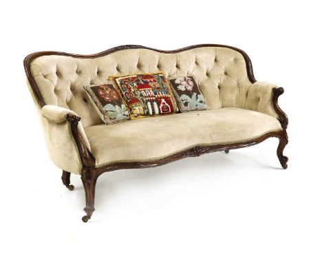 A Victorian walnut settee, the buttoned back above stuffover seat on cabriole supports,165cm wide,80cm deep,88cm highBuying t