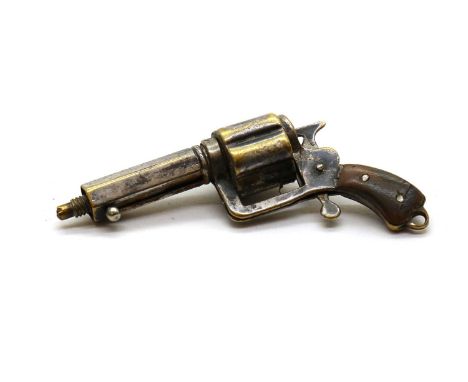 A silver plated revolver watch fob,late 19th century, with a spring-loaded trigger activated propelling pencil,4cm longProven