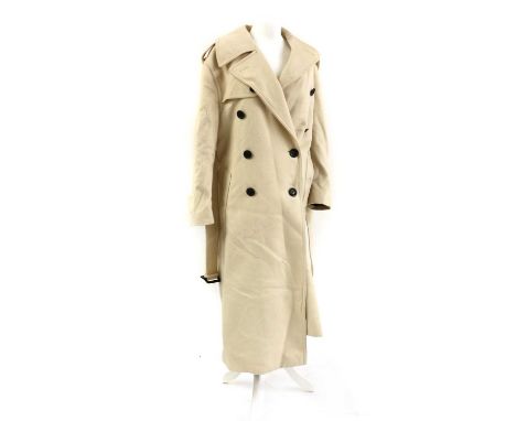 A Tom Ford cream double breasted full length coat,with slip pockets to each side, and belt, size not stated, approximate size