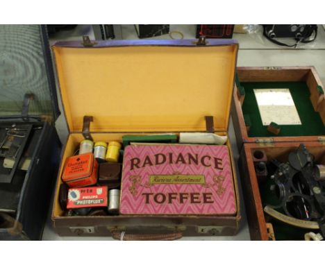 Old brown case of camera sundries