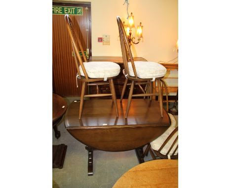 Priory oak table and four stick back chairs