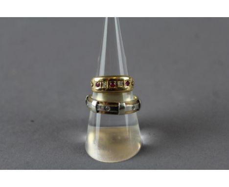 Bi metal ring and yellow metal ruby & diamond ring
