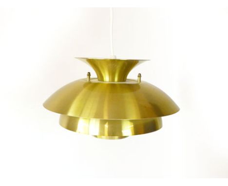 A 1970's brass coloured four tier ceiling light of squat form in the manner of Louis Poulsen 
 CONDITION REPORT: Some wear an