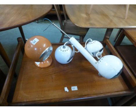 A 1970's white enamelled lamp with three spherical adjustable spotlamps, together with a later orange spherical light
 CONDIT