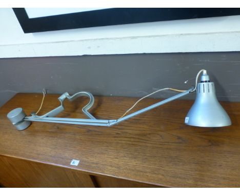 A Haddock Horstman Ltd. adjustable desk lamp on a counter balance and clamp mechanism
 CONDITION REPORT: Working order unknow