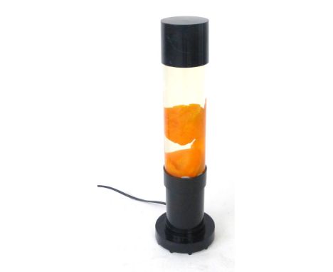 A 1980/90's Mathmos lava lamp in a black case, h. 40 cm
 CONDITION REPORT: Working order unknown