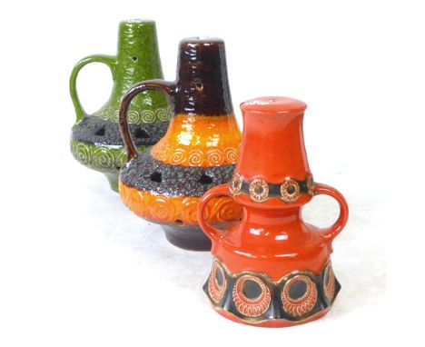 Three West German pottery lamp bases decorated in red, yellow and orange glazes CONDITION REPORT: No fittings