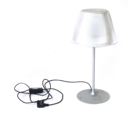 Philippe Starck for Flos, a 'Romeo' table lamp, the moulded glass shade and cover on a silvered shaft and tulip-type base CON
