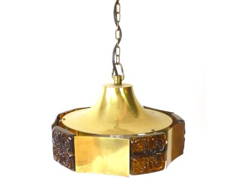 A 1970's brass coloured and abstract perspex ceiling light of squat form
