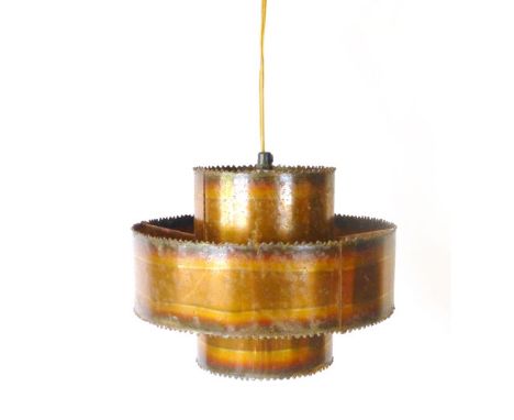 A copper coloured ceiling light with an outer rim and 'tooth'-type edges
 CONDITION REPORT: Some wear and knocks, some minor 