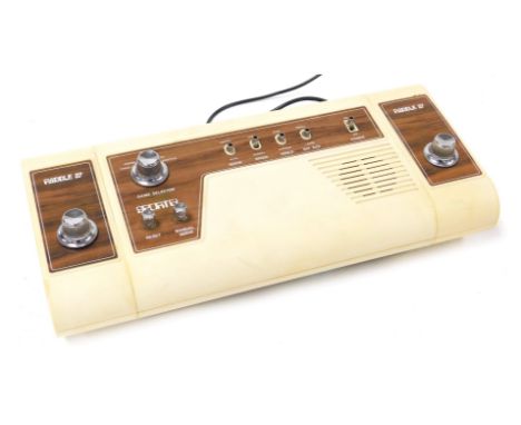 A Sportel Paddle IV games console, with detachable remote controls, and four games, comprising tennis, football, squash and p
