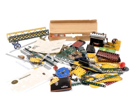 A selection of metal Meccano, construction pieces and a steam stationery engine. (a quantity)