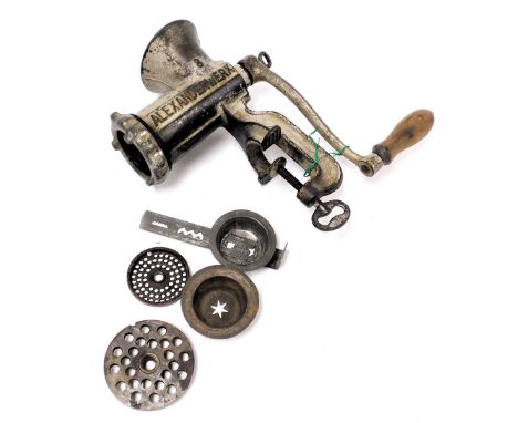 A vintage Alexanderwerk model 8 meat mincer, with attachments.