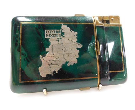 A post WW2 cigarette case and lighter, with a faux green marble casing, overlaid in white metal with a map and engraved detai