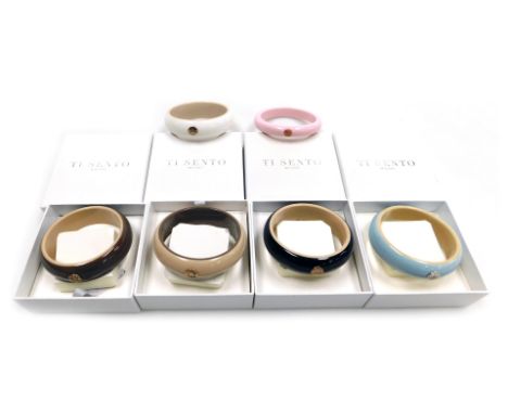 Five Ti Sento of Milano designer bangles, various colours, four boxed, together with a similar pink bangle, bearing four init
