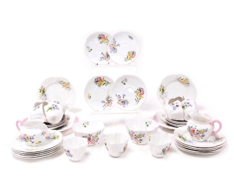 A Shelley porcelain Wild Flowers pattern tea service, comprising pair of bread plates, pair of cream jugs and sugar bowls, el