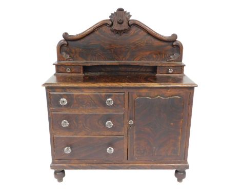 A Victorian scumbled pine Lincolnshire dresser, the foliate carved back with a shelf above two short drawers, over three draw