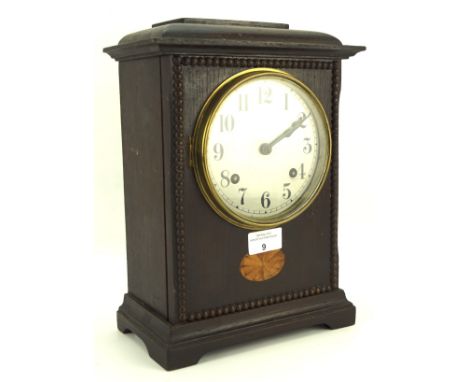 A 20th century British Jerome painted wooden mantel clock, with parquetry decoration to front, the silvered dial with Arabic 