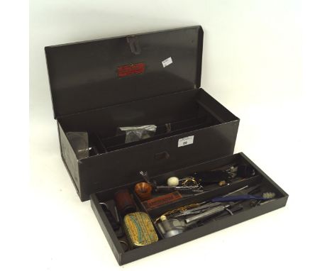 An assortment of watch maker's tools, including chains, clamps, straps, etc contained within a metal storage box L38.5cm