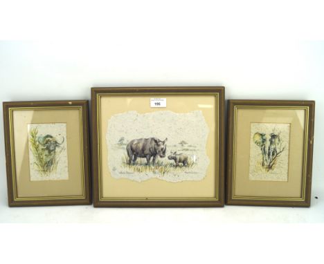 Three Sheila Cooper prints of animals, including a limited edition print of a white rhino no.437/1000, largest frame measurin
