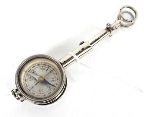 A vintage chrome French travelling compass with magnifiers
