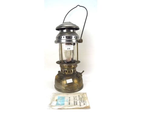 A vintage Bat hanging oil lamp, applied with oval bat badge, on domed base, H32cm