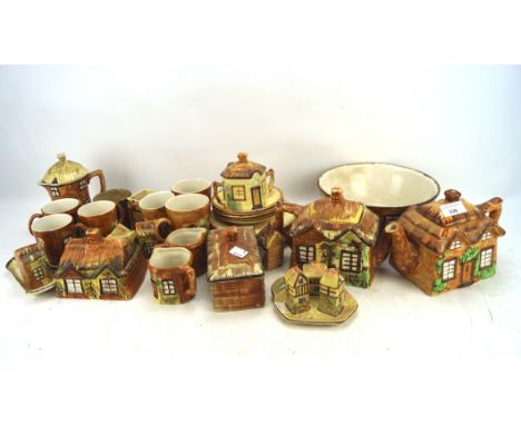 A group of Price Kensington pottery Cottage Wares and other related ceramics, including bowls, plates, mugs, salt and pepper 