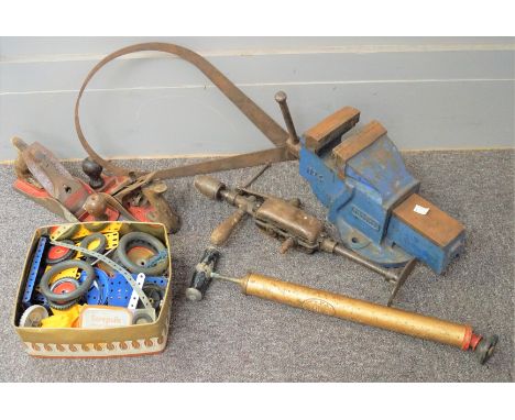 A assorment of tools to include a vice