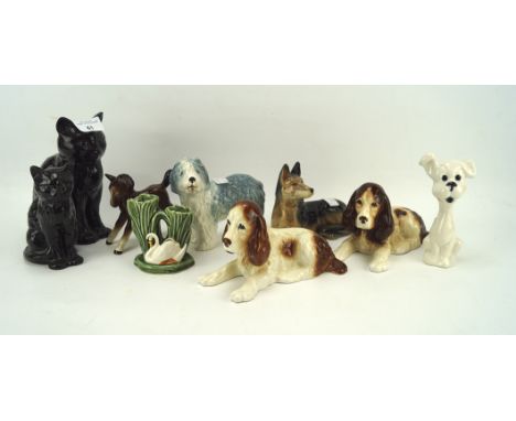 A collection of Sylvac and other ceramic animals, including figures of dogs and cats, max. H17.3cm