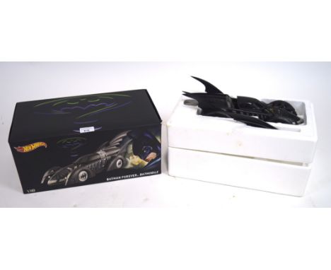 A modern Hotwheels Batman forever Batmobile, 1:18 scale, in original box
