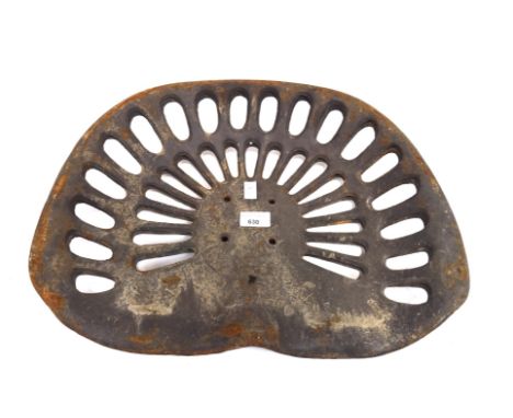 Two cast metal tractor seats, L47cm