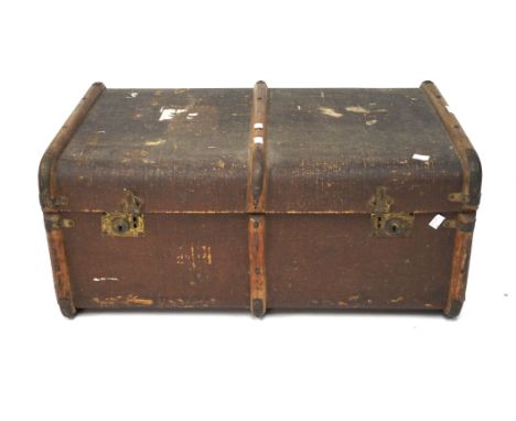 A vintage wooden mounted travelling trunk and a leather bound suitcase, the trunk measuring L77cm