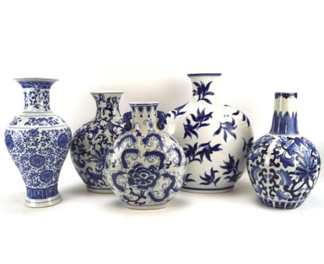 Five contemporary blue and white Chinese ceramic vases, including three moon flasks, largest H34cm 