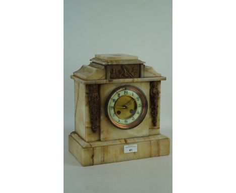 A late 19th/early 20th century marble mantel clock, the dial with Arabic numerals denoting hours, with brass decoration, H28c
