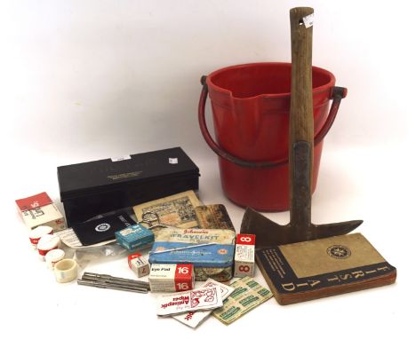 A vintage red fireman's bucket and axe, together with a Boots Pure Drug Co first aid kit, in original metal tin