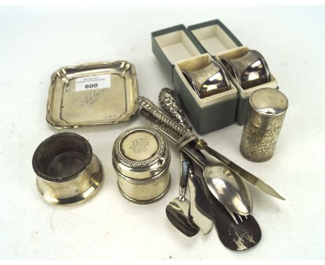 An assortment of silver and white metal, including napkin rings, square tray, flatware, etc