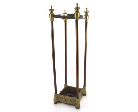 A 20th century metal stick/umbrella stand, with brass detailing, H62cm 