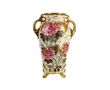 VICTORIAN BONN PORCELAIN VASE, of baluster form with twin gilt dolphin handles, hand-painted with roses, gilt highlights on t