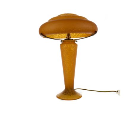 EARLY 20TH CENTURY ART GLASS TABLE LAMP AND SHADE, of mushroom form, in mottled orange tones, 50cm high, wired