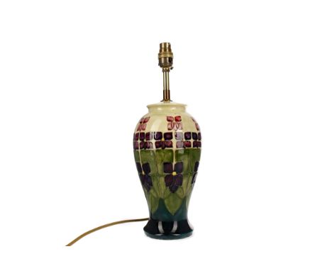 CONTEMPORARY MOORCROFT TABLE LAMP, of baluster form, tube-lined with stylised flowerheads on a graduated cream to turquoise g