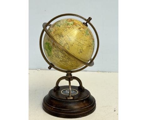 Desk globe with compass on wooden base 